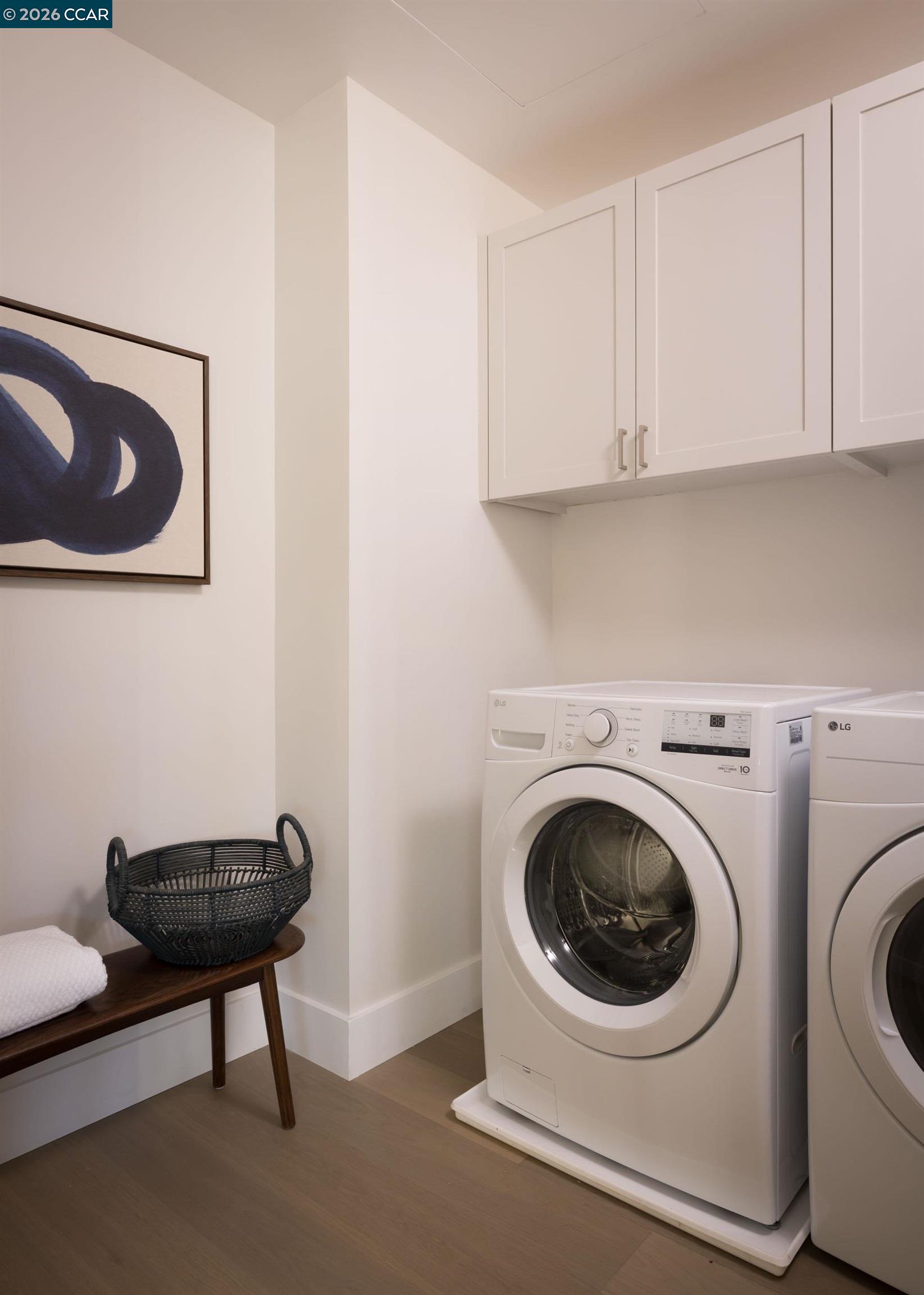 950 Hough Avenue, Unit 202 Lafayette, CA 94549 - Photo 24 of 38 a view of a room with washer and dryer