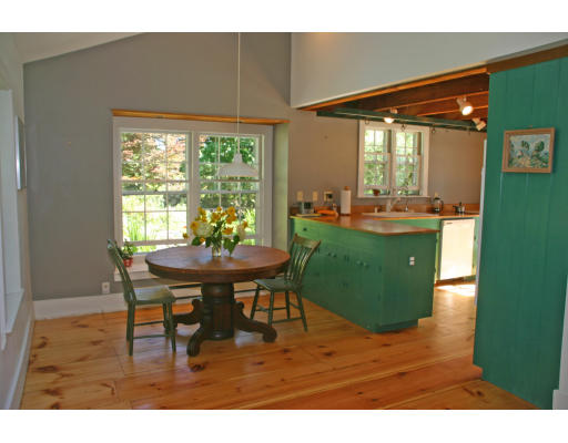 593 Middle Road Boxborough, MA 01719 - Photo 3 of 19 a view of a dining room with furniture and window