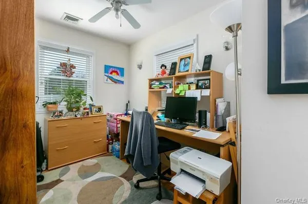 a room with furniture and a window