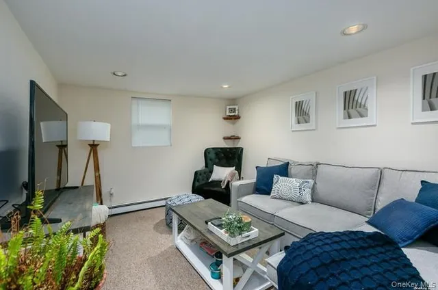 a living room with furniture and a couch