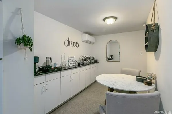 a bathroom with a sink and mirror