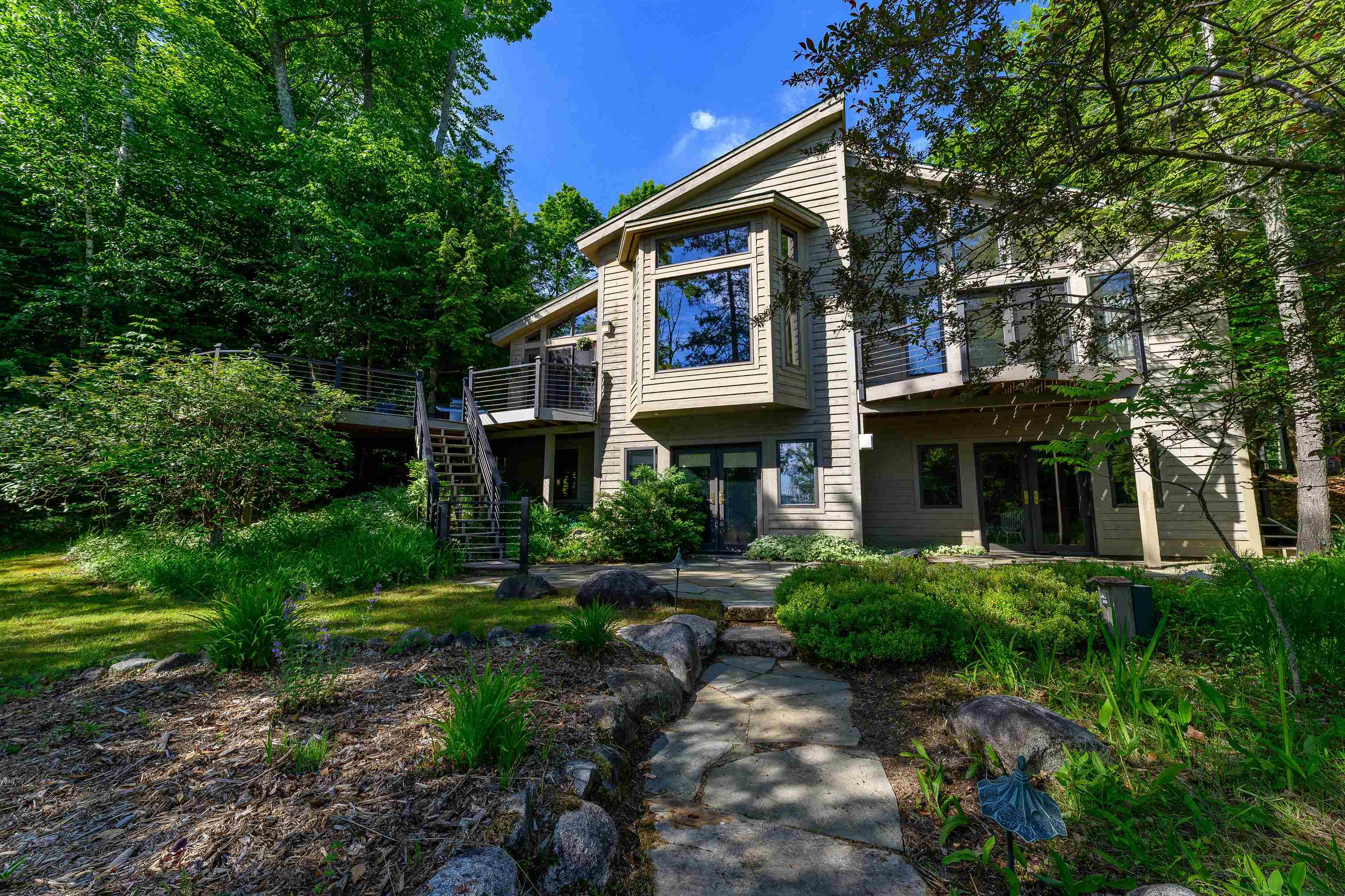12246 Pine Ridge Trail Kewadin, MI 49648 - Photo 1 of 63