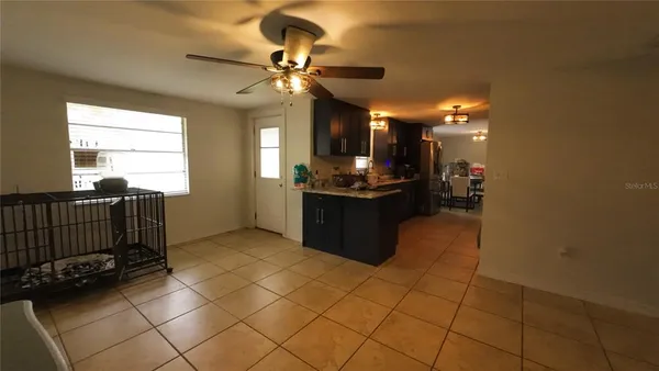 a kitchen with stainless steel appliances a sink and cabinets