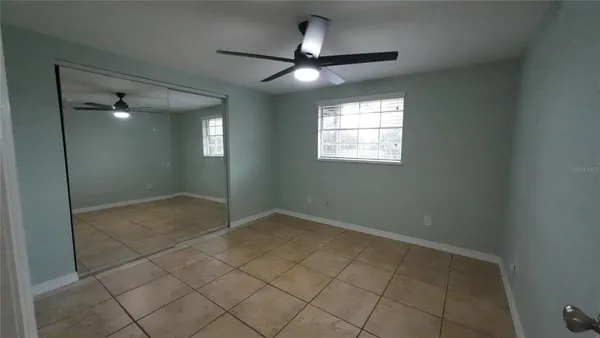a view of an empty room and window
