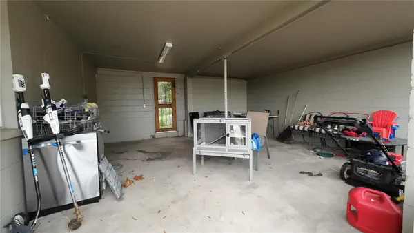 a front view of a house with parking space