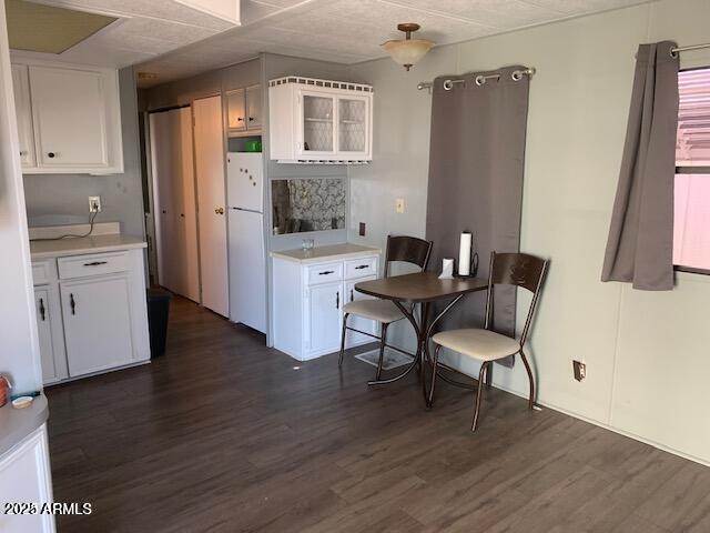 306 South Recker Road, Unit 134 Mesa, AZ 85206 - Photo 2 of 5 a living room with stainless steel appliances granite countertop furniture wooden floor and a kitchen view