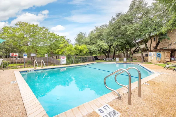 an outdoor space with patio furniture