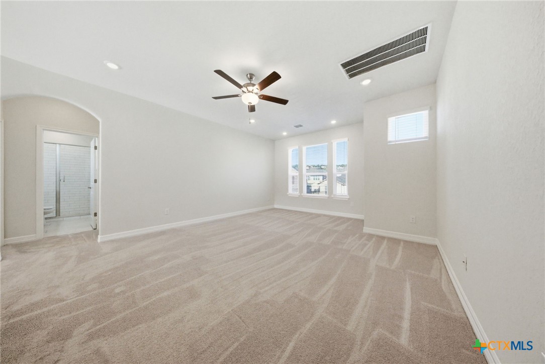 662 Hidden View Street New Braunfels, TX 78130 - Photo 30 of 46 a view of an empty room with a window