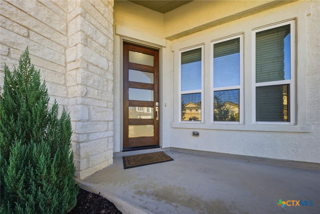 662 Hidden View Street New Braunfels, TX 78130 - Photo 4 of 46 a view of an entrance of the house