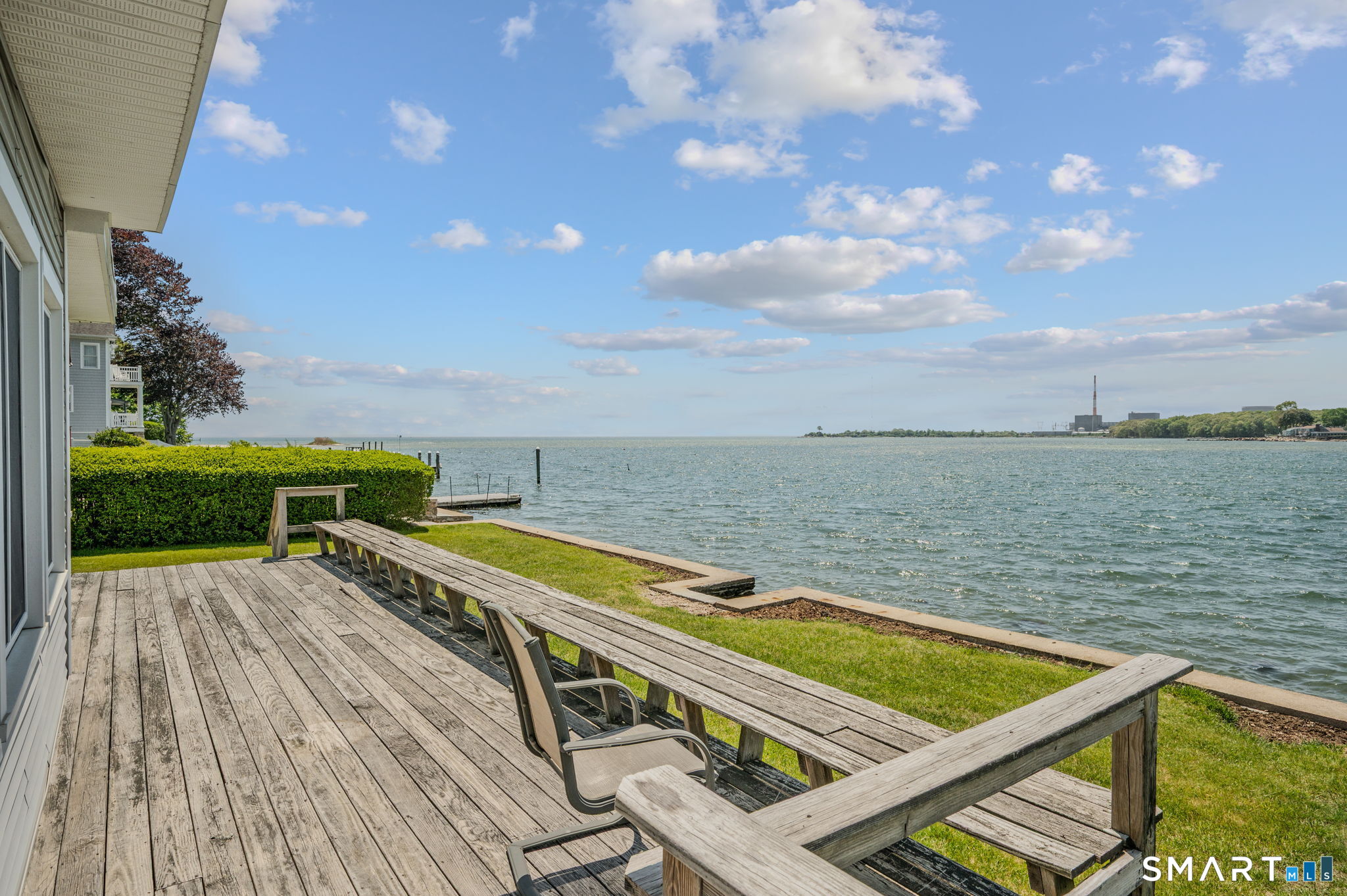 210 Shore Road Waterford, CT 06385 - Photo 5 of 26 a view of a terrace with outdoor seating and lake