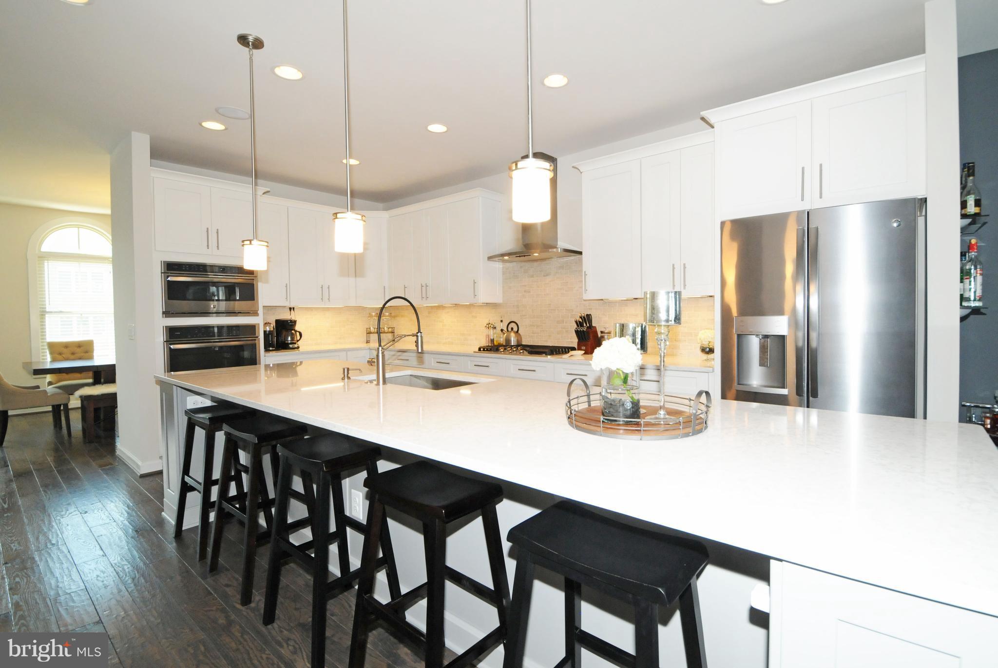 2354 Chadlington Road Falls Church, VA 22043 - Photo 10 of 41 MARBLE-STYLE QUARTZ, 3 PENDANTS & SEATING FOR 5