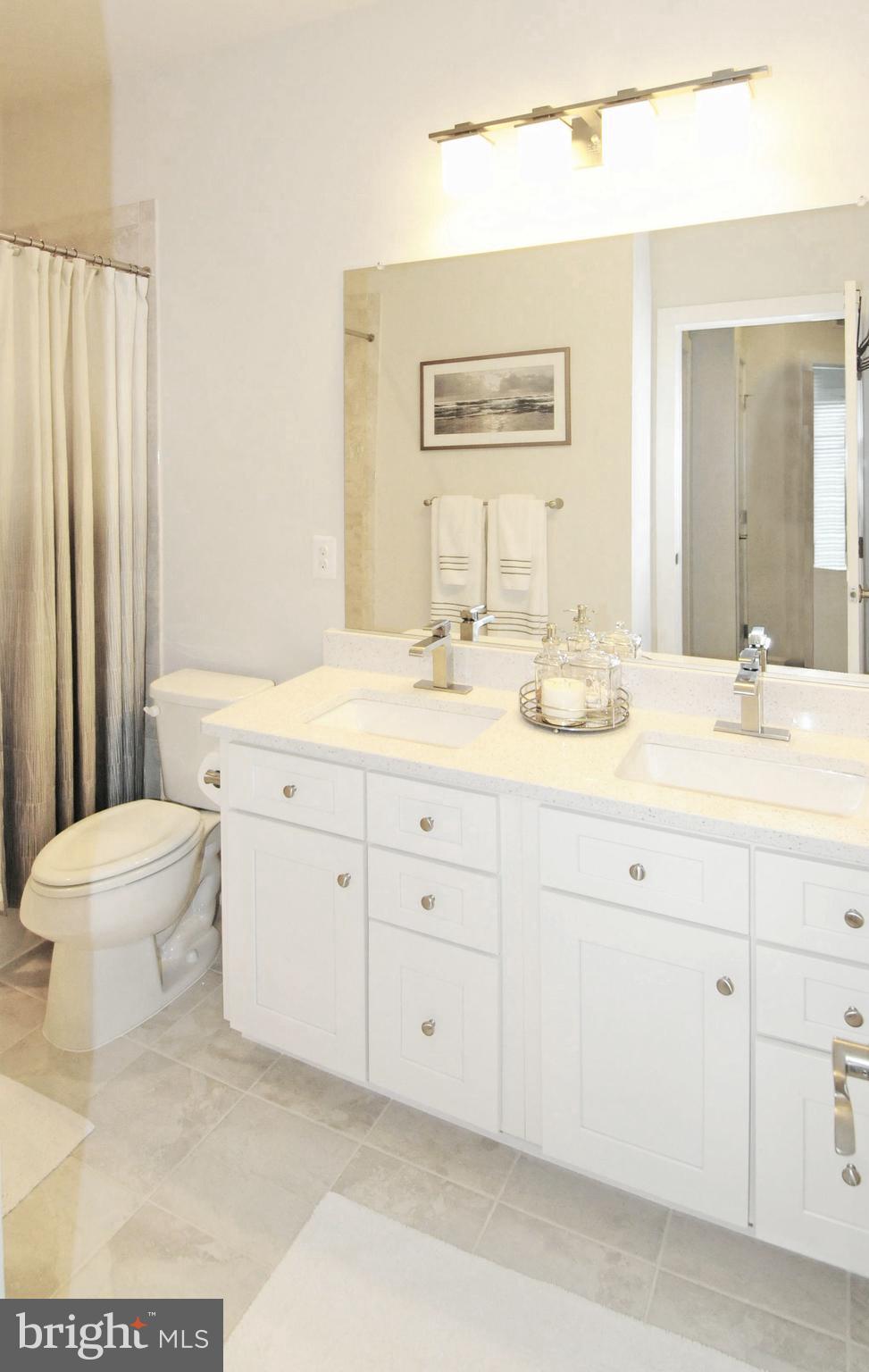 2354 Chadlington Road Falls Church, VA 22043 - Photo 26 of 41 UPPER HALL BATH HAS GENEROUS VANITIES & 2 SINKS