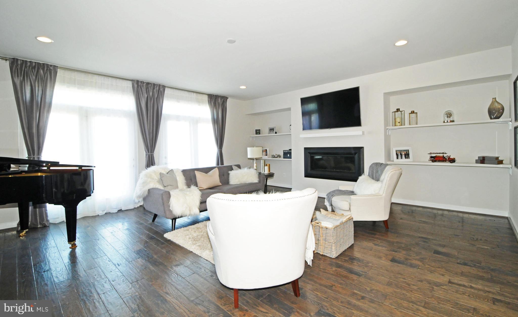 2354 Chadlington Road Falls Church, VA 22043 - Photo 4 of 41 LIVING ROOM WITH WIDE HARDWOOD & RECESSED LIGHTS