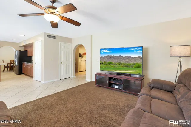 a view of an entryway with workspace and window