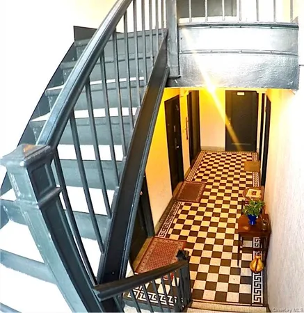 a view of balcony with wooden floor
