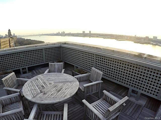 390 Riverside Drive, Unit 12AC Manhattan, NY 10025 - Photo 20 of 29 a view of sitting area on roof deck
