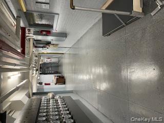 390 Riverside Drive, Unit 12AC Manhattan, NY 10025 - Photo 22 of 29 a view of a room with gym equipment