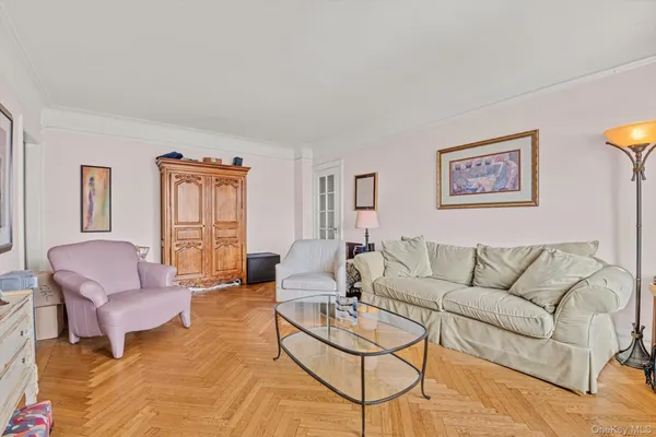 a living room with furniture and a window