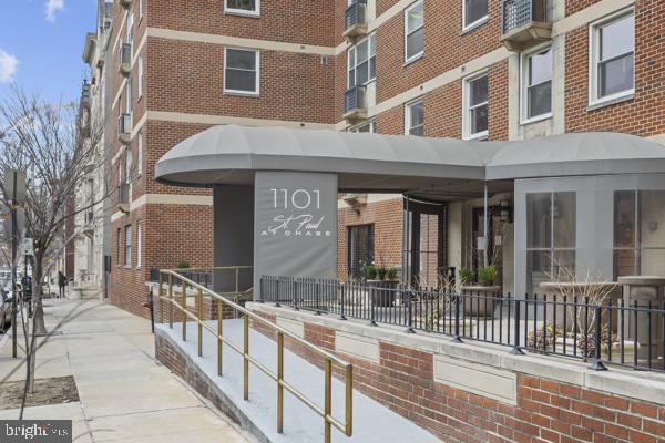 1101 St Paul Street, Unit 710 Baltimore, MD 21202 - Photo 20 of 21 a view of a building with a large window