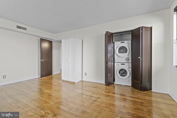1101 St Paul Street, Unit 710 Baltimore, MD 21202 - Photo 4 of 21 a view of a storage & utility room with washer and dryer