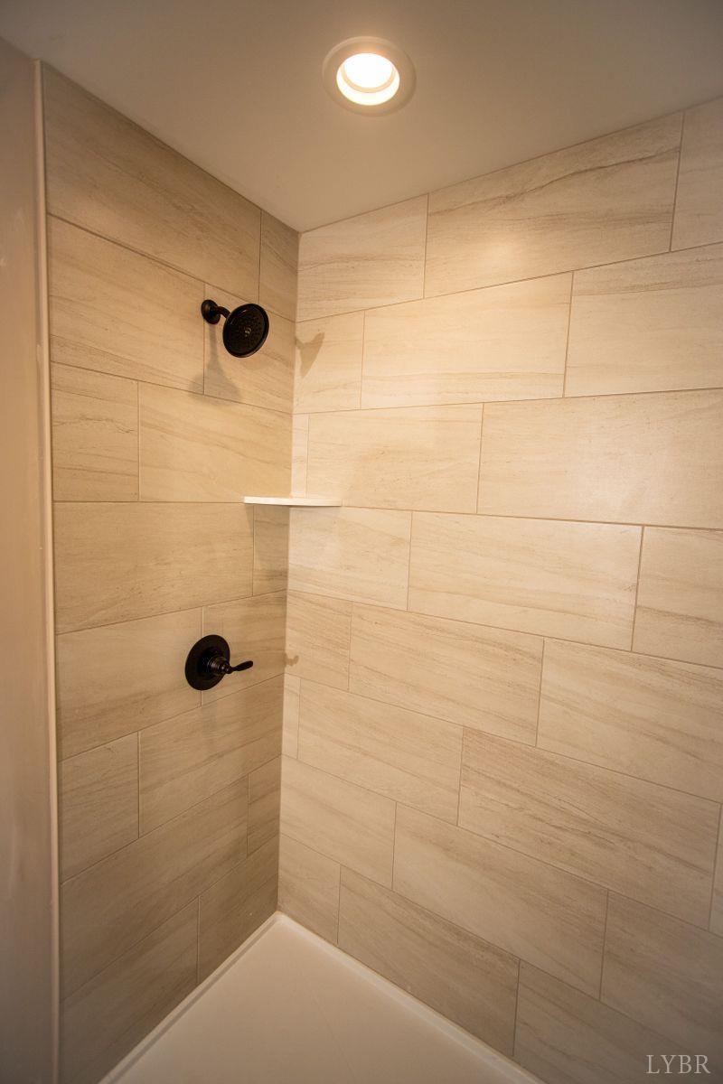 108 Montfair Drive Amherst, VA 24521 - Photo 15 of 39 a bathroom with a shower