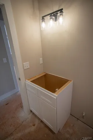 a view of an empty room and window