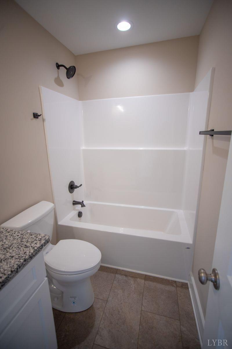 108 Montfair Drive Amherst, VA 24521 - Photo 21 of 39 a bathroom with a toilet and a shower