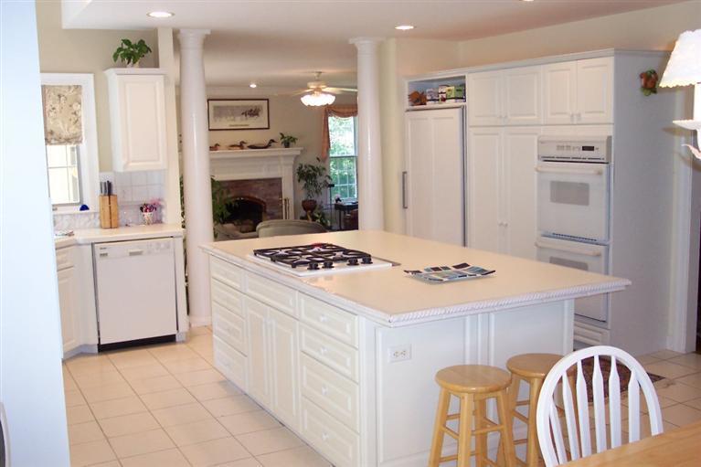 45 Bumps River Road Osterville, MA 02655 - Photo 5 of 21 a kitchen with a stove a refrigerator and a stove