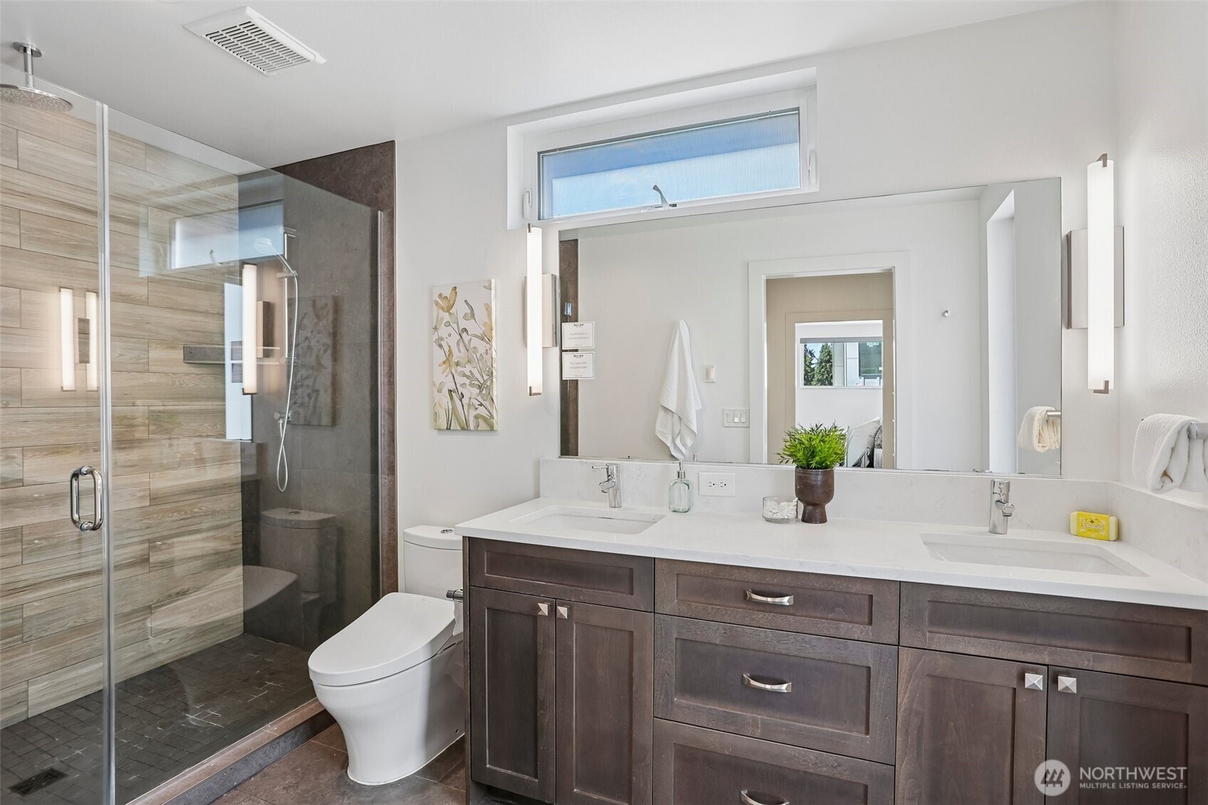 1926 Ferry Avenue Southwest Seattle, WA 98116 - Photo 19 of 40 a spacious bathroom with a granite countertop toilet sink and shower