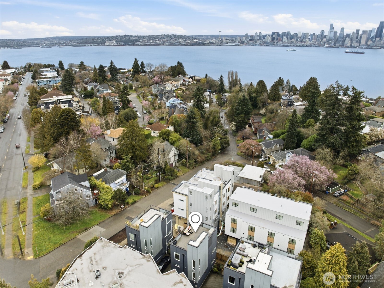1926 Ferry Avenue Southwest Seattle, WA 98116 - Photo 39 of 40 an aerial view of a house with a lake view