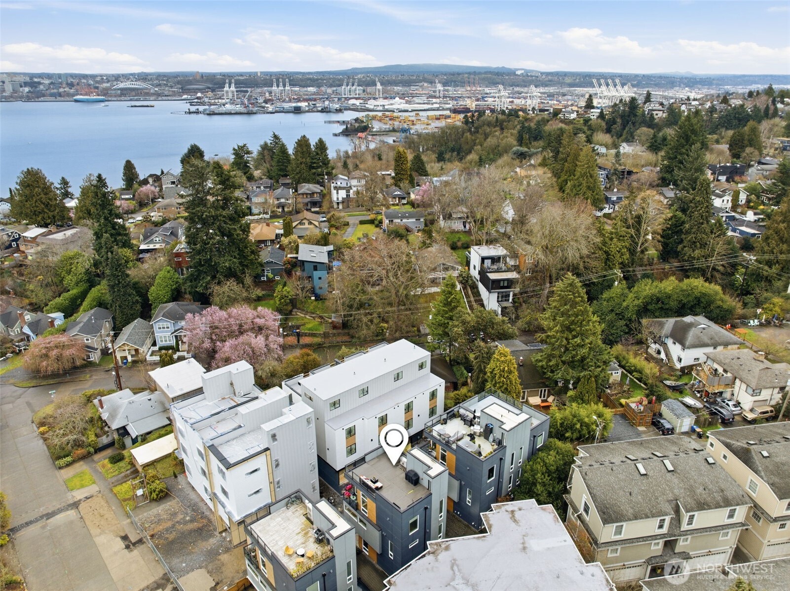 1926 Ferry Avenue Southwest Seattle, WA 98116 - Photo 40 of 40 a view of a lake with couches and city view