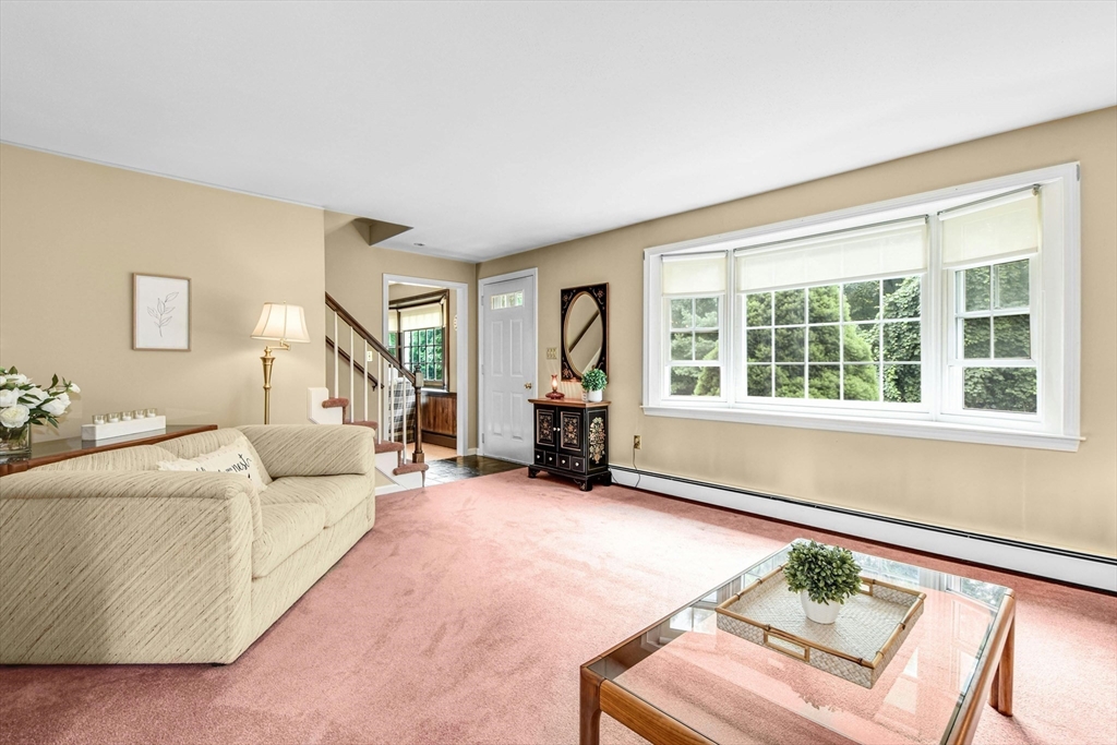 36 Turner Street Norfolk, MA 02056 - Photo 15 of 41 a living room with furniture and a large window