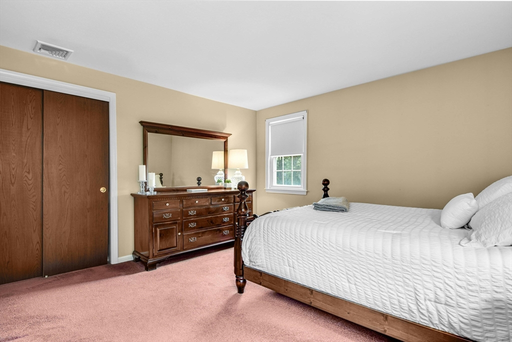 36 Turner Street Norfolk, MA 02056 - Photo 18 of 41 a bedroom with a bed and a window