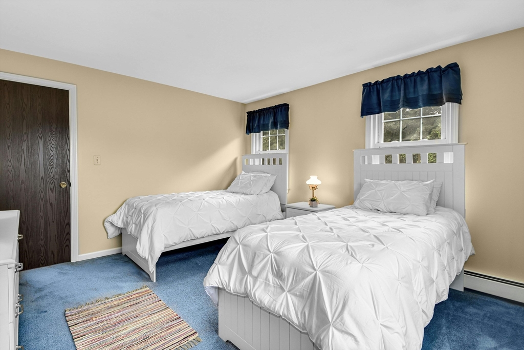 36 Turner Street Norfolk, MA 02056 - Photo 20 of 41 a bedroom with two beds and a night stand