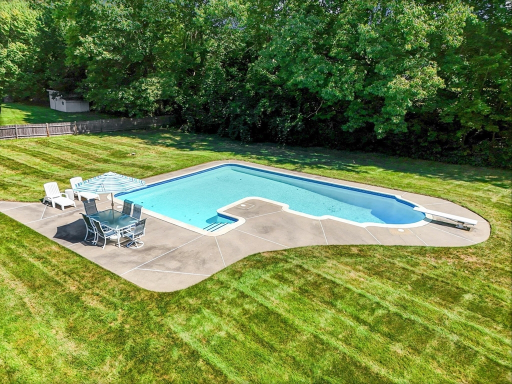 36 Turner Street Norfolk, MA 02056 - Photo 32 of 41 a view of a swimming pool with a yard
