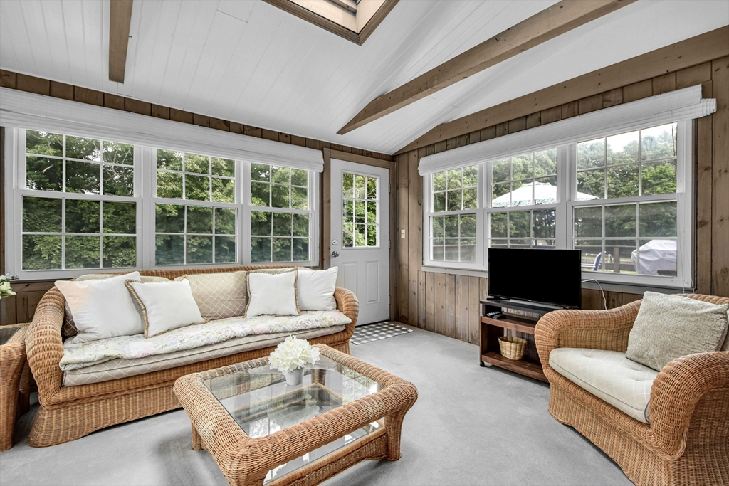 36 Turner Street Norfolk, MA 02056 - Photo 8 of 41 a living room with furniture and a flat screen tv