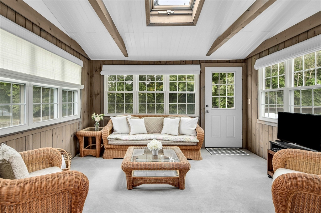 36 Turner Street Norfolk, MA 02056 - Photo 9 of 41 a living room with furniture and a flat screen tv