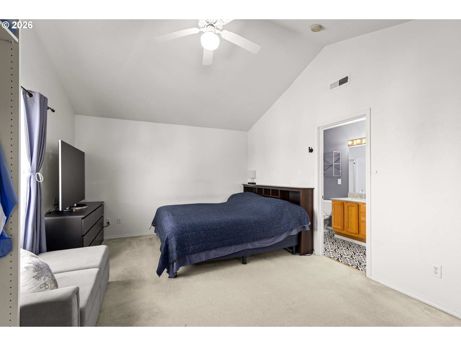 3418 Northwest 30th Circle Camas, WA 98607 - Photo 15 of 43 a bedroom with a bed and a television