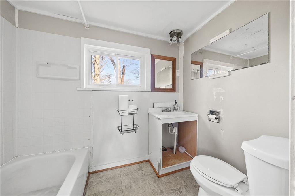 587 Brownsdale Road Renfrew, PA 16053 - Photo 22 of 36 The bathroom is located on the main level and is ready for renovation