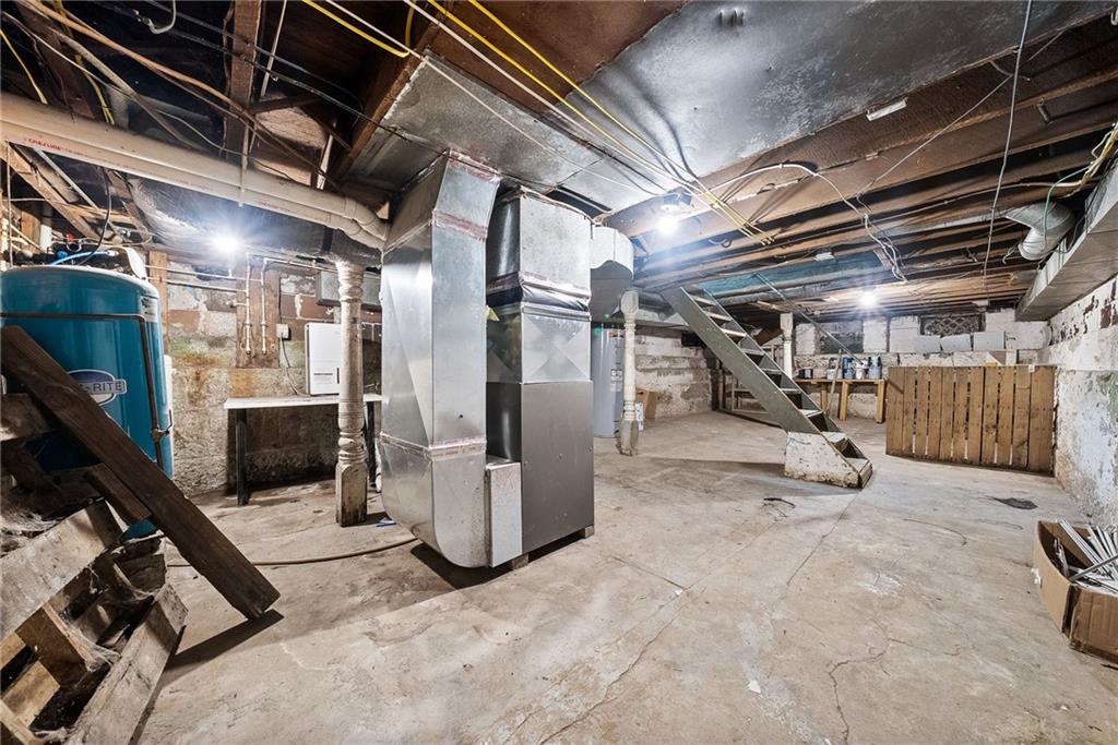 587 Brownsdale Road Renfrew, PA 16053 - Photo 35 of 36 Basement is equipped with a sump pump, water softener (rented from Culligan), and new furnace 2024