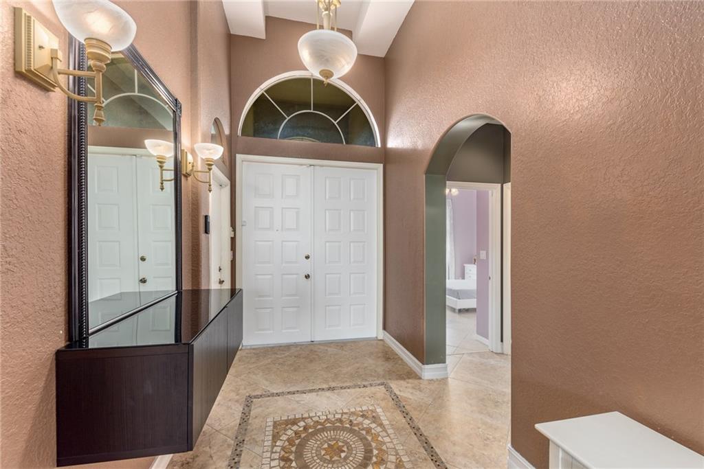 2103 Northwest Marsh Rabbit Lane Stuart, FL 34994 - Photo 5 of 20 a front door view of a house