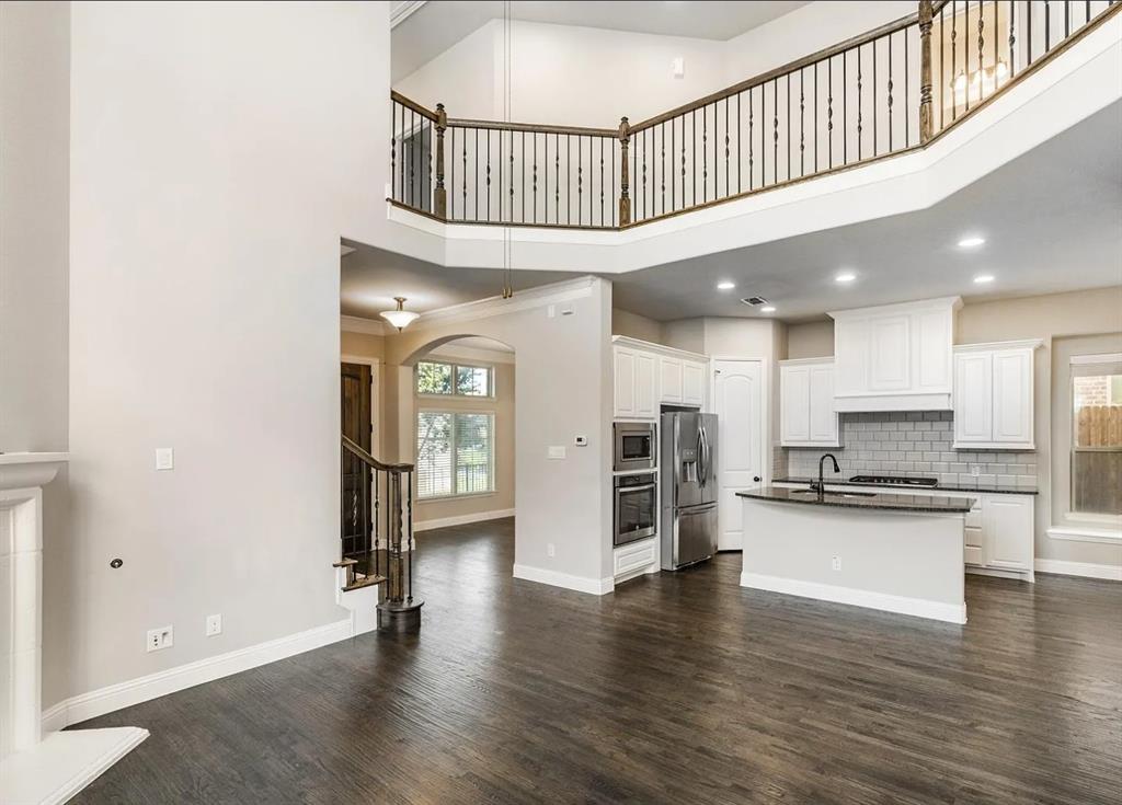 5215 Wakefield Drive Irving, TX 75038 - Photo 12 of 36 a view of kitchen with stainless steel appliances granite countertop a stove and a refrigerator