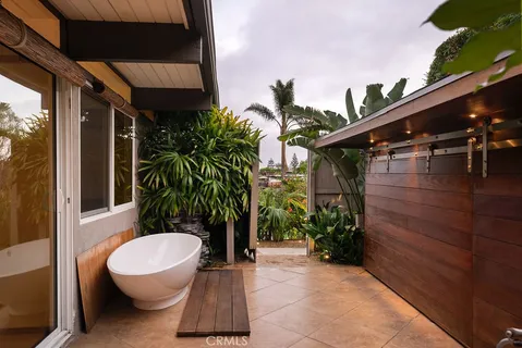 a house view with a garden space