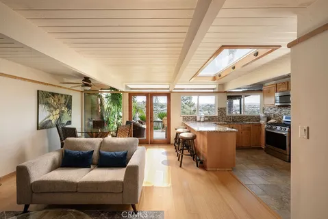 a bedroom with a bed and a television