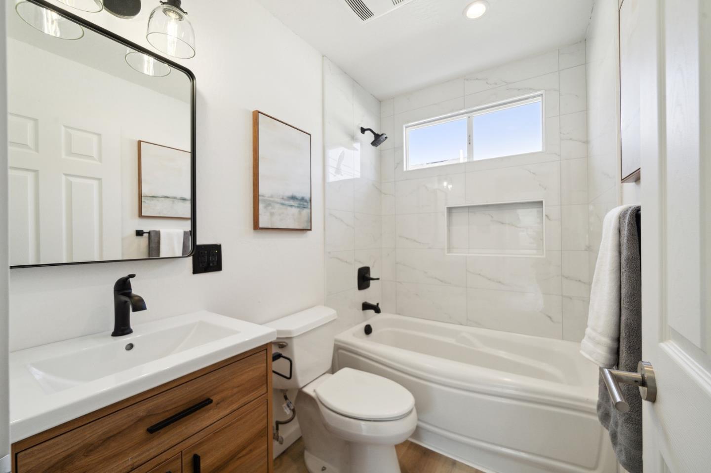 1324 Peralta Road Pacifica, CA 94044 - Photo 12 of 25 a bathroom with a sink a toilet and a bathtub