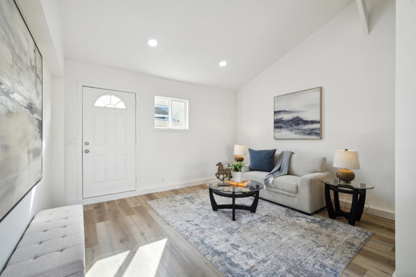 1324 Peralta Road Pacifica, CA 94044 - Photo 16 of 25 a living room with furniture and a couch