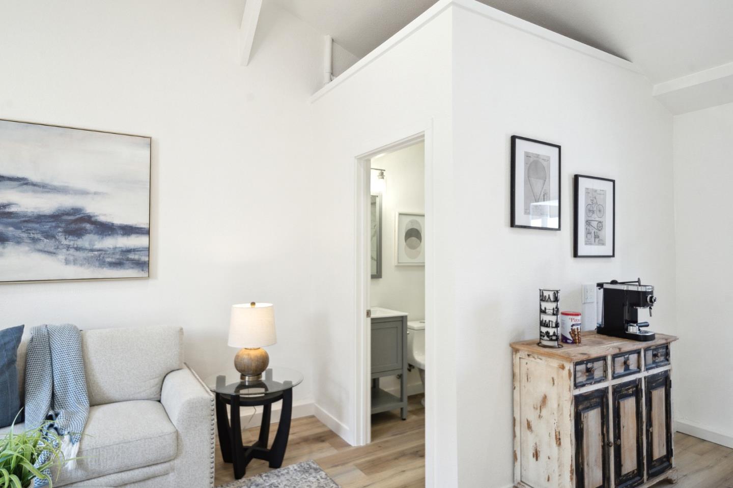 1324 Peralta Road Pacifica, CA 94044 - Photo 18 of 25 a living room with furniture and a fireplace