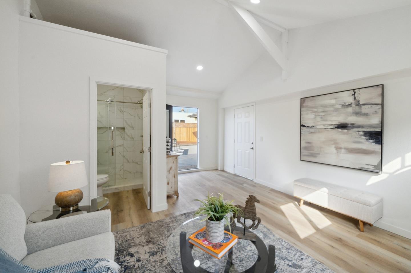1324 Peralta Road Pacifica, CA 94044 - Photo 20 of 25 a living room with furniture and a potted plant