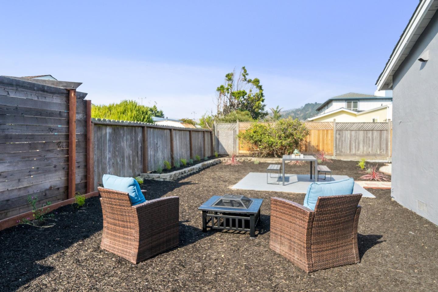 1324 Peralta Road Pacifica, CA 94044 - Photo 25 of 25 a outdoor living space with furniture and a potted plant