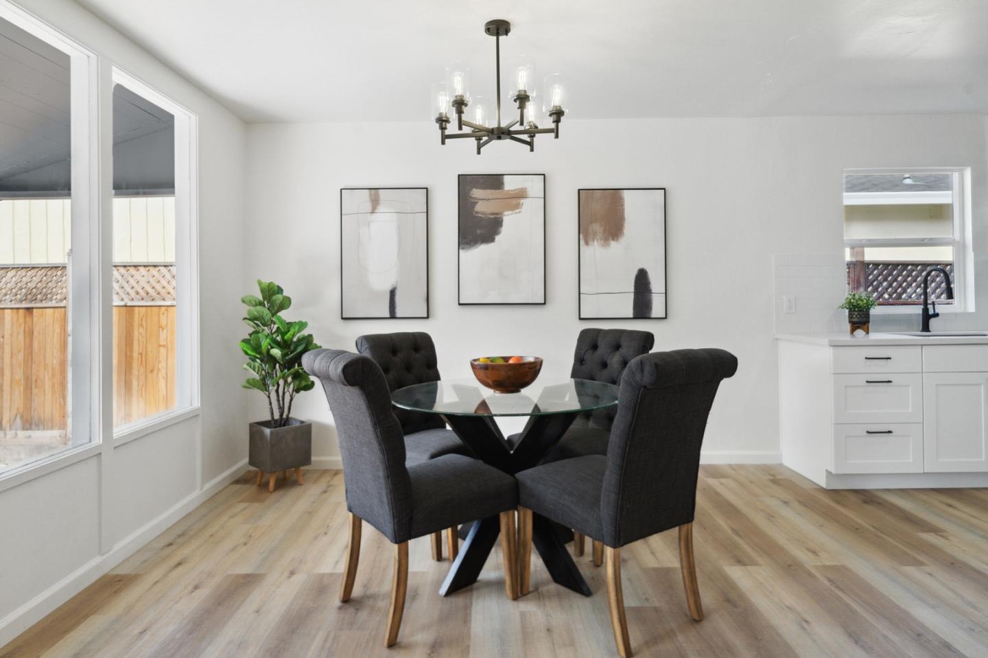 1324 Peralta Road Pacifica, CA 94044 - Photo 4 of 25 a view of a dining room with furniture window and wooden floor